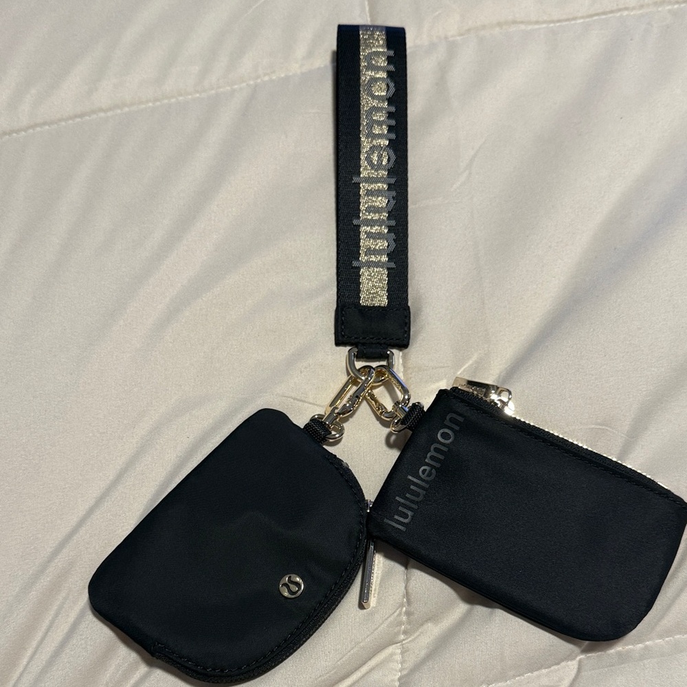 Lululemon Gold Black dual pouch wristlet